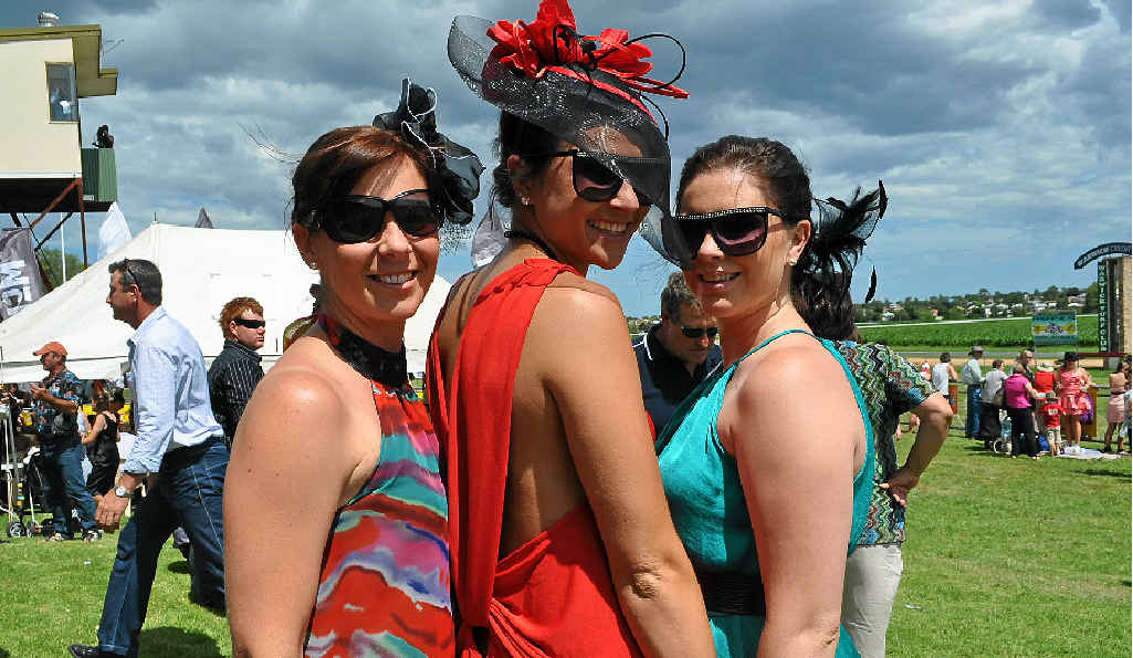 PRETTY DRESSES: Michelle Hoffmann, Caitlin McBaron and Sarah Roseworne look beautiful trackside at Allman Park. PRETTY DRESSES: Michelle Hoffmann, Caitlin McBaron and Sarah Roseworne look beautiful trackside at Allman Park.